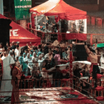 Lucha libre AAA con lluvia pero presentes